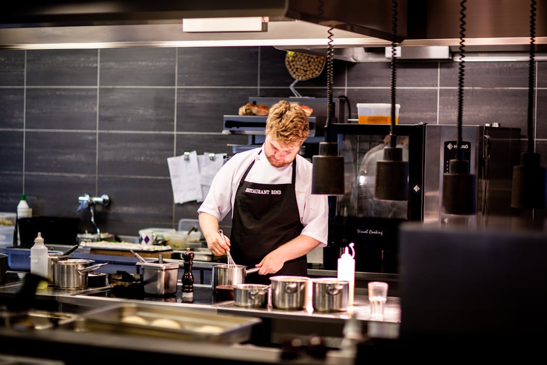 Professional kitchen setting for a paid culinary internship in France